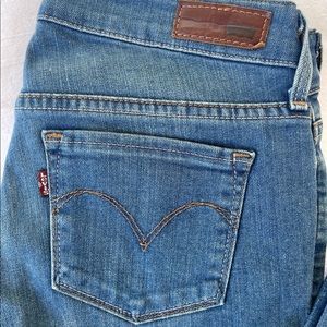 Levis - Medium Blue Denim Stretch, Slight Curve Skinny, Moderate Rise, Size 25